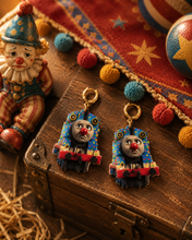 Load image into Gallery viewer, Detailed view of Silly Sidetracks cartoon earrings.

